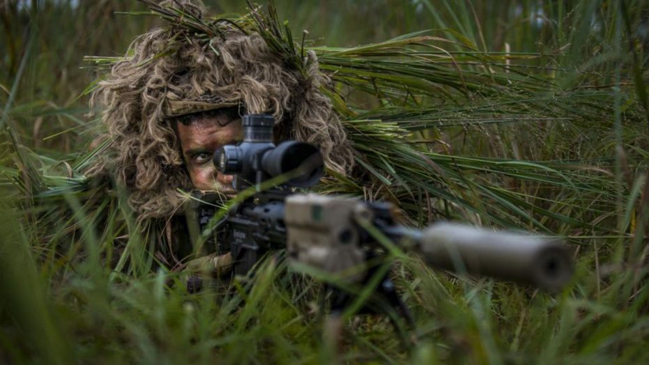 Decked out in camo in the wilderness